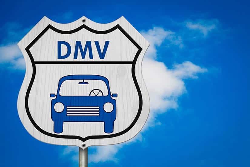 DMV Sign with Blue Sky