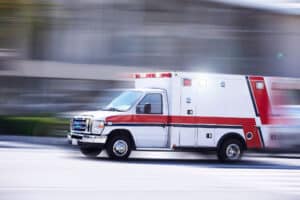 Blurred motion action view of an ambulance responding to the scene of an emergency